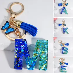 Porte-clés bleu mer avec lettre de l'alphabet pour femme, breloques de portefeuille, pendentif pompon papillon avec porte-clés, cadeau de bijoux, A à Z, 26 initiales