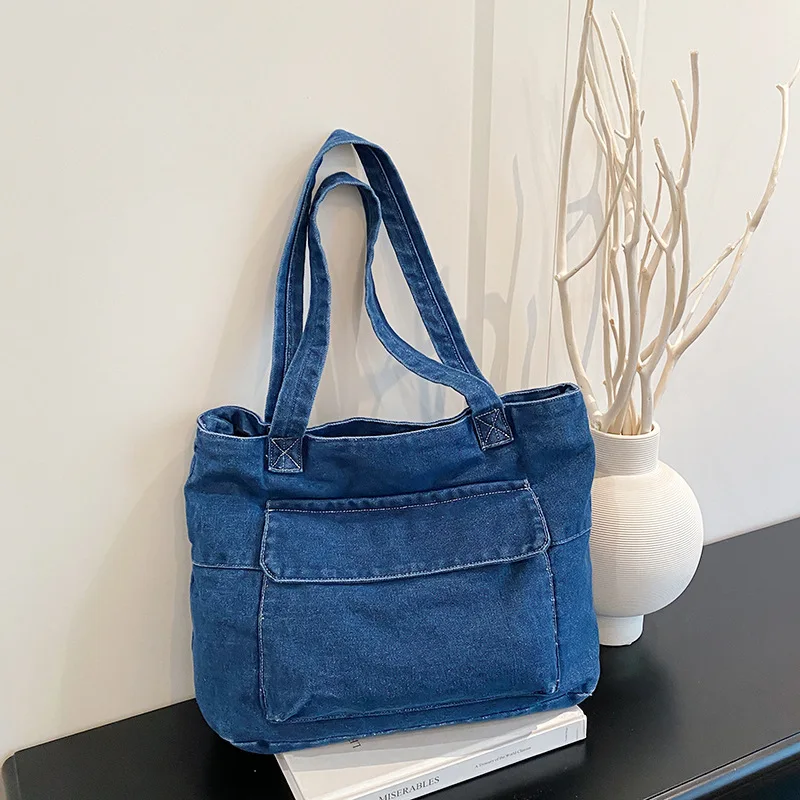 

Новая весенняя женская джинсовая сумка с ручками, удобная и универсальная, текстурная сумка через плечо, простая однотонная, моющаяся сумка для хранения
