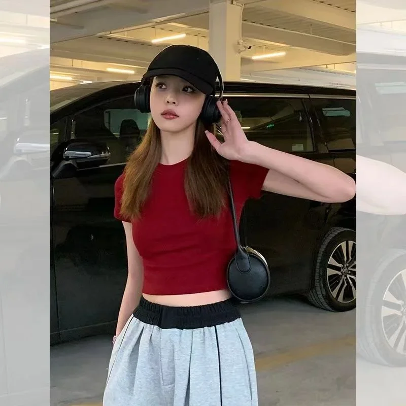 T-shirt à manches courtes femmes été épicé fille coupe ajustée ventre court exposant haut rouge à la mode confortable Style décontracté