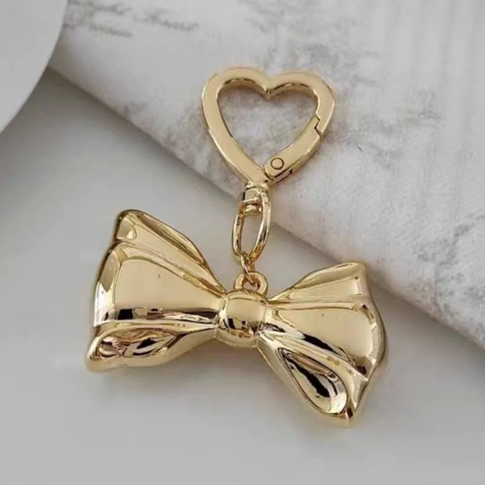JOY2K-Porte-clés à breloques avec nœud papillon pour sac à main, pendentif en perles, accessoires de sac à main, décorations de face, mignon, plus