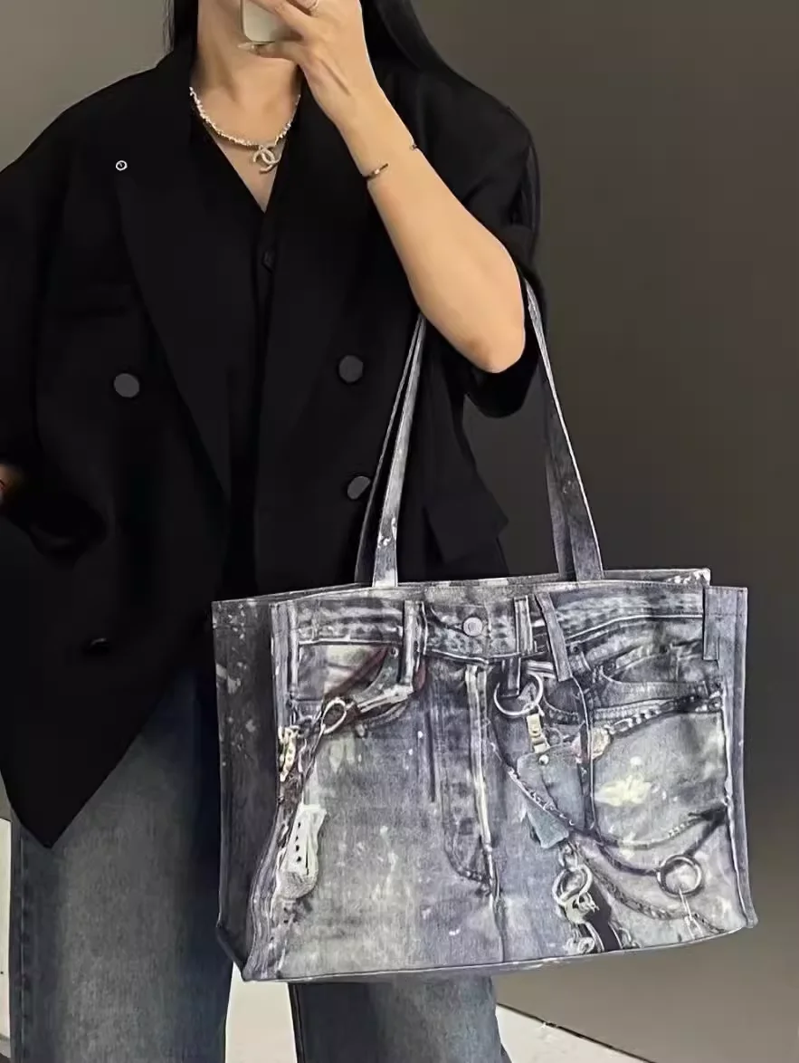 Bolso de hombro de mezclilla con estampado creativo de colores mezclados, bolso de mano de bolsillo de Jeans novedoso personalizado, bolso de compras de retazos Popular para mujer