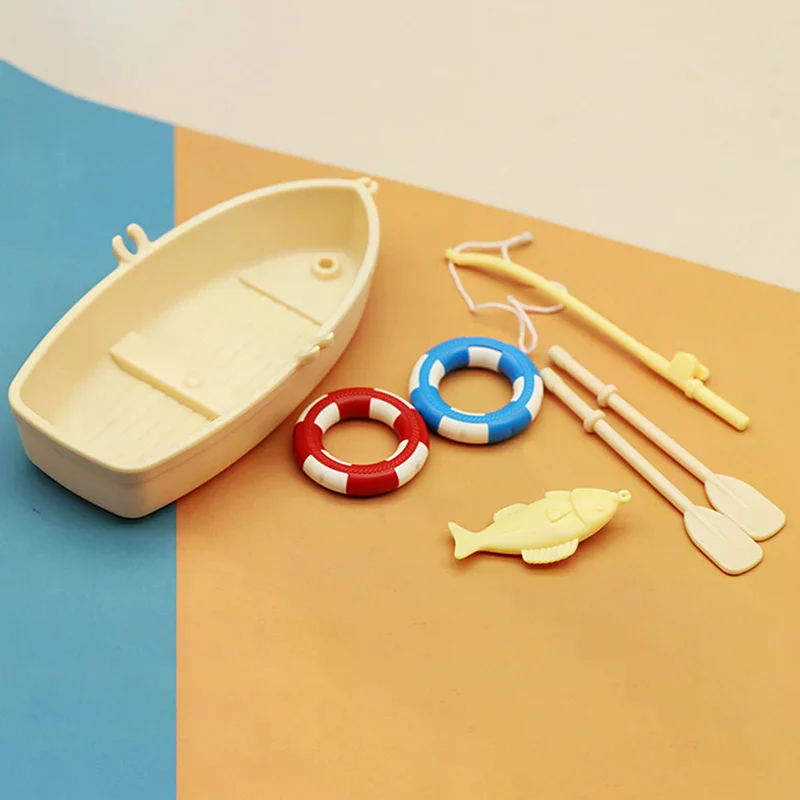 1 Set Regali per bambini Nuovo modello di barca da pesca in plastica Mini ornamenti simulati per casa delle bambole Kit barca da pesca in miniatura