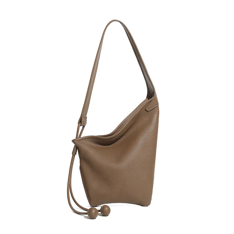 

Leather slouchy dumpling bag niche asymmetric design minimalist knot ox horn bag, single shoulder messenger bag for women