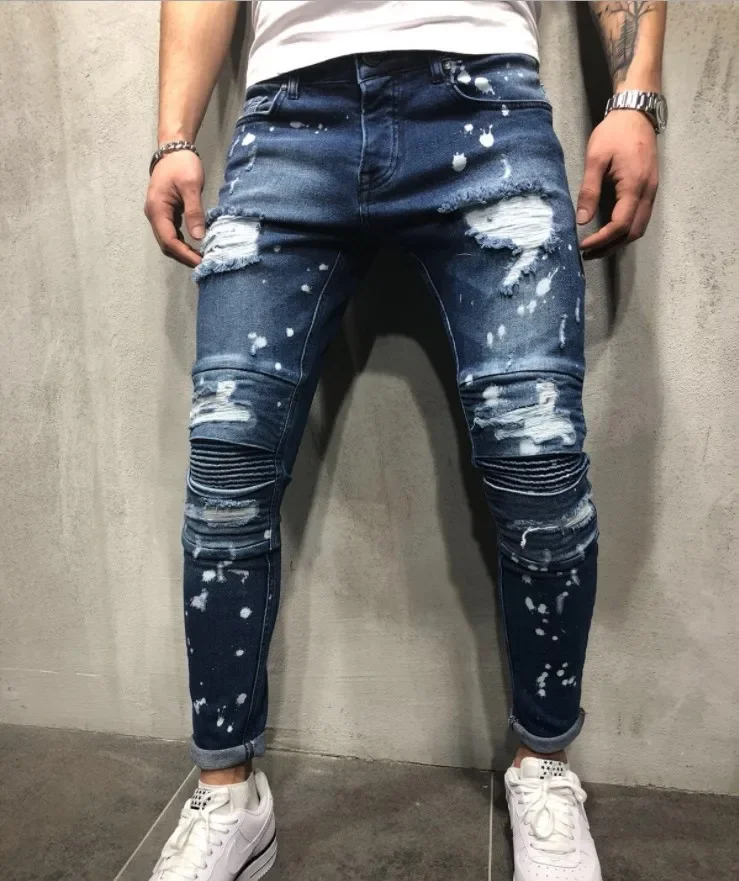 European and American Men's Autumn and Winter Leisure Slim-fit Skinny Jeans with Knee Ripped and Spliced with Splashed Ink Dots.