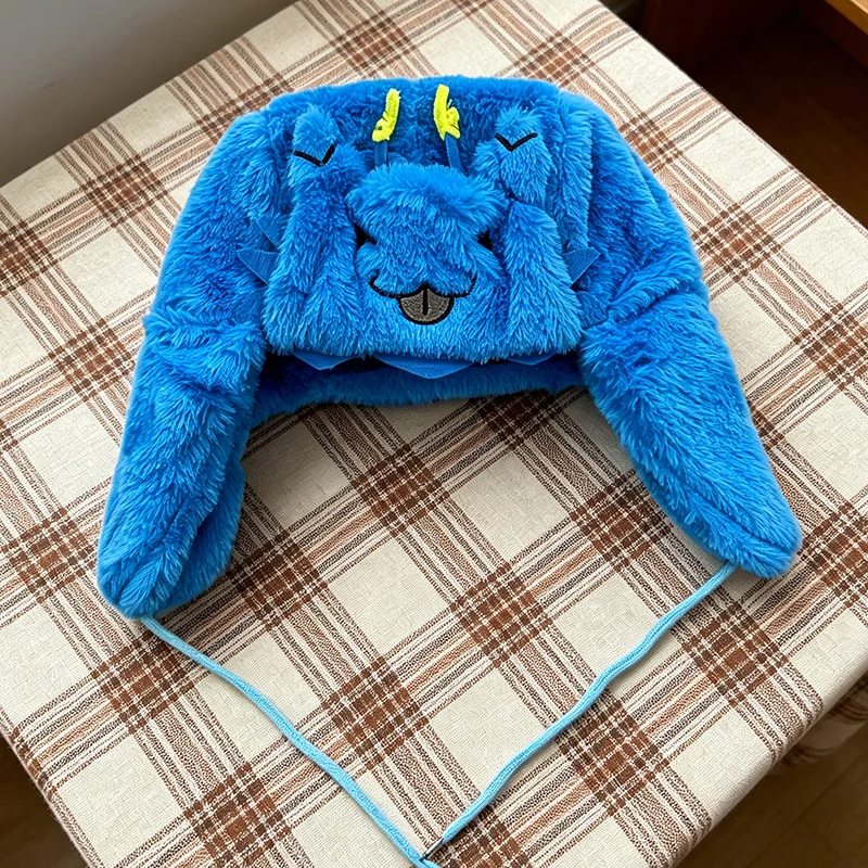 Blauer, trendiger, mit Cartoon-Motiven bestickter Lei Feng Hut, Plüsch-Ohrenschutzhut mit Sternmuster, Pullover-Mütze.