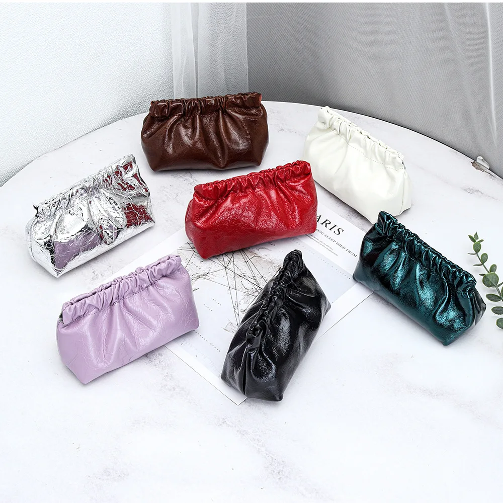 First layer cowhide oil wax burst pattern change bag women's new shrapnel closed coin bag lipstick earphone storage bag