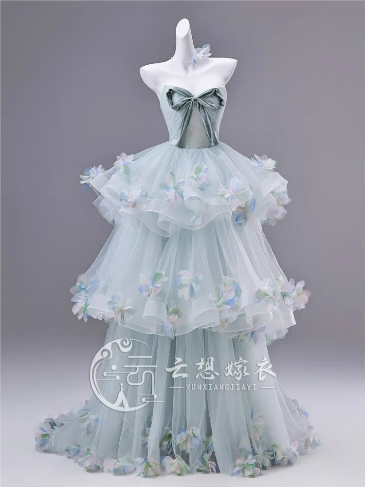 Strapless sleeveless blue three-dimensional flower-tied mid-length performance dress