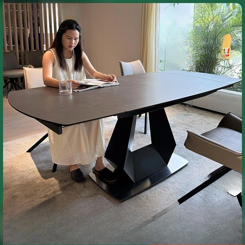 

Italian minimalist retractable carbon steel high-end Italian imported Calais rock slab dining table and chair combination