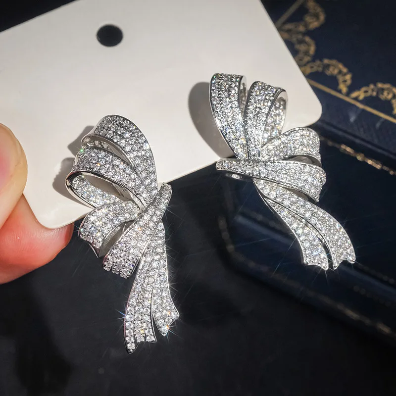 ZAKOL Luxuriöse Voll-Pavé-Zirkonia-Ohrstecker mit Schleifen-Design für Damen, Funkelnde CZ-Knoten-Hängeohrringe, Hochzeits- und Party-Schmuck – Detail 9