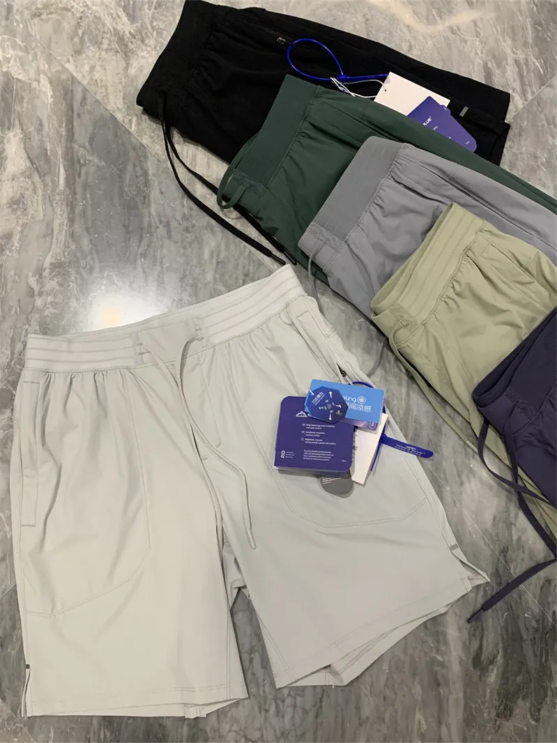 

Lightweight Breathable Summer Cool Feeling High Elastic Loose Simple Outdoor Quick Dry Sports Shorts for Men Nylon Lycra