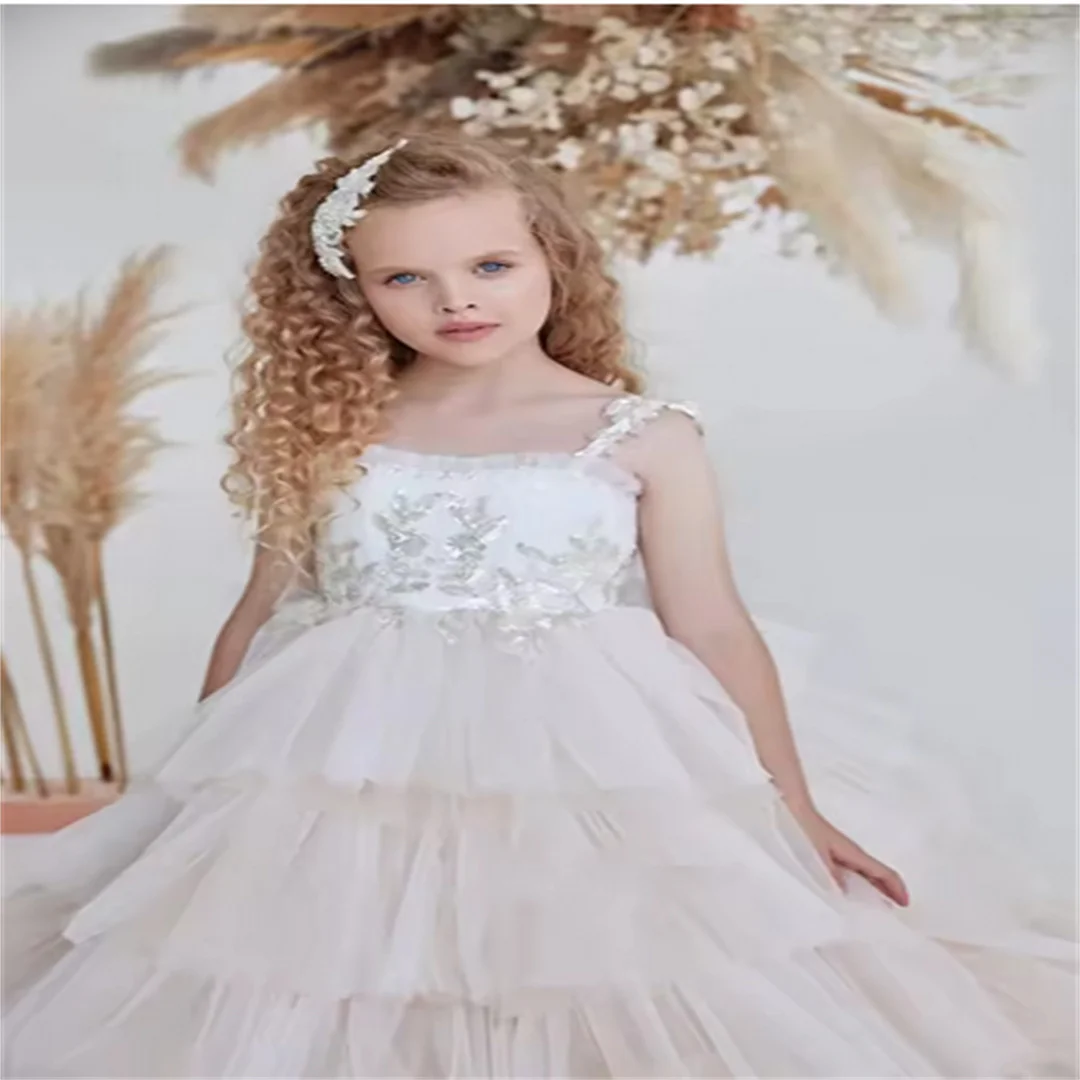 ชุดเดรสเด็กผู้หญิงสีชมพูอ่อนแบบไม่มีแขนประดับเลื่อมสำหรับงานแต่งงาน งานวันเกิด งานพิธีศีลมหาสนิทครั้งแรก ดีไซน์หรูหราแบบมีชั้น