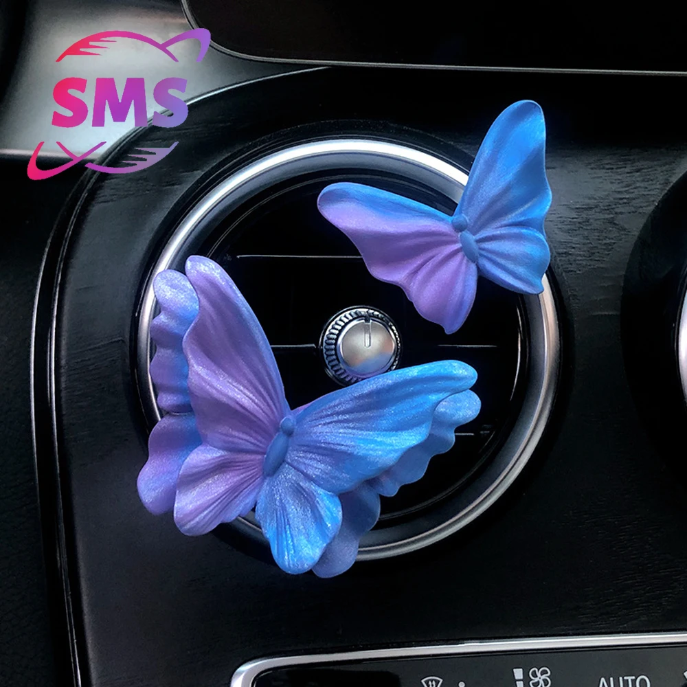 

Aromatherapy at the air outlet of car air conditioner Perfume diffuser with perfume Butterfly, flower, interior decoration