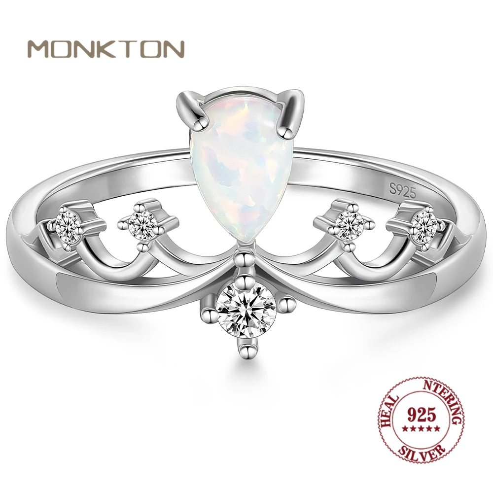 

Monkton S925 Sterling Silver Princess Crown Wedding CZ Band Premium Blue Artificial Opal Crown Rings for Women