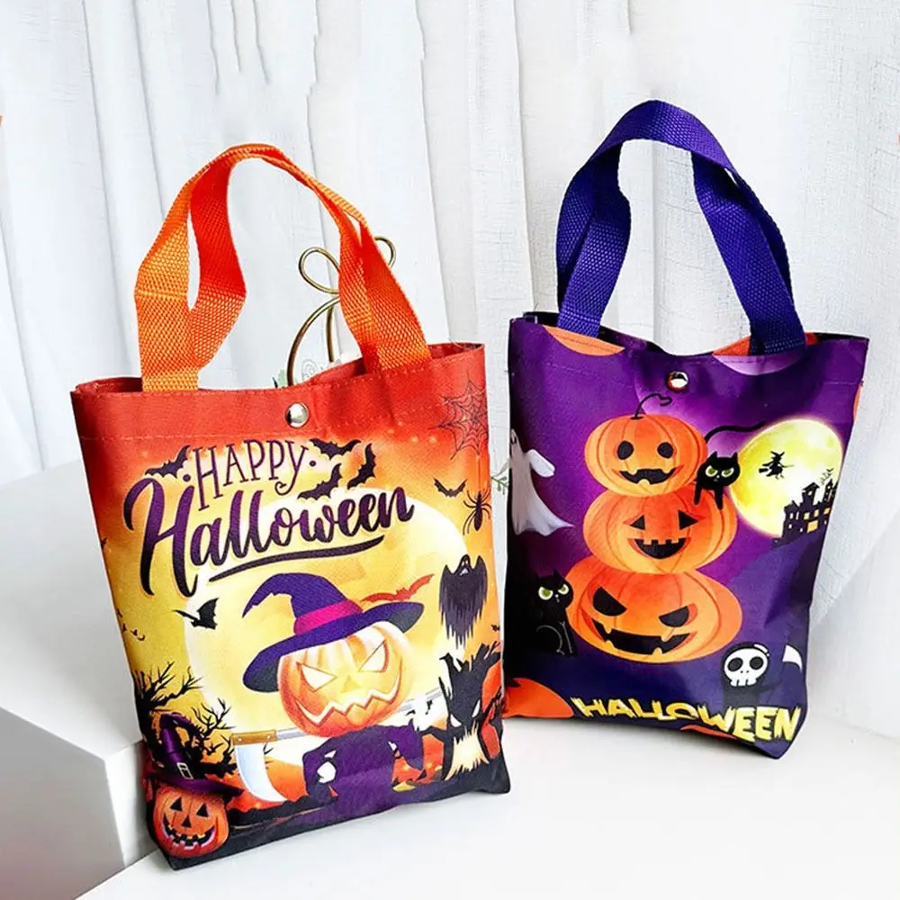 ハンドヘルドハロウィンキャンディトートバッグ カボチャ柄デザイン ポータブルハロウィントリートバッグ 軽量巾着/スナップボタン