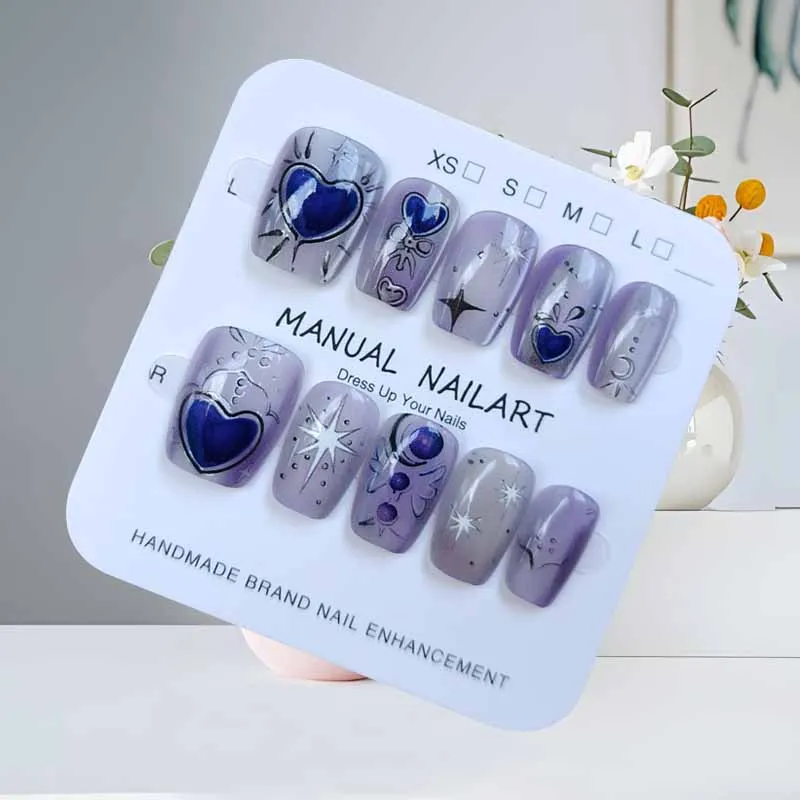 เล็บปลอมกดติดลายแมวตาสี่แฉกน่ารัก 10 ชิ้น สีขาวประดับทอง สวยหรู ระดับไฮเอนด์ สำหรับตกแต่งเล็บ