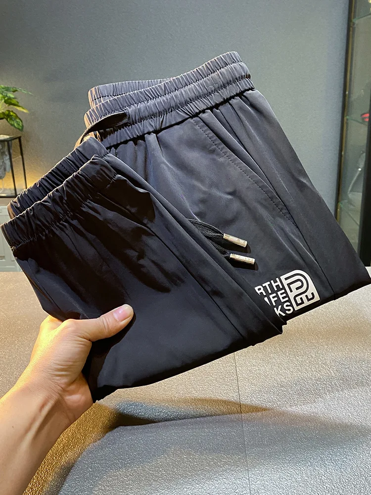 

Light luxury draping silky casual pants men's summer Thin Ice Silk quick-drying cool cropped sports jogger pants