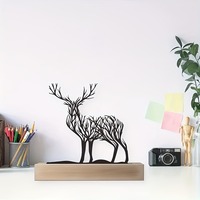 Stylish iron deer with wooden base. Perfect for office desks, living room decorations, etc. Ideal gift for holidays