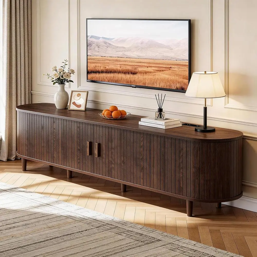 

70 Walnut Entertainment Center with Sliding Doors, Adjustable Shelves & Power Outlet