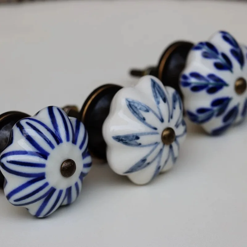 

Vintage Ceramic Cabinet Knob, White with Blue Floral Pattern,Hand-Painted Design, Bronze Hardware, Drawer Pull for Furniture