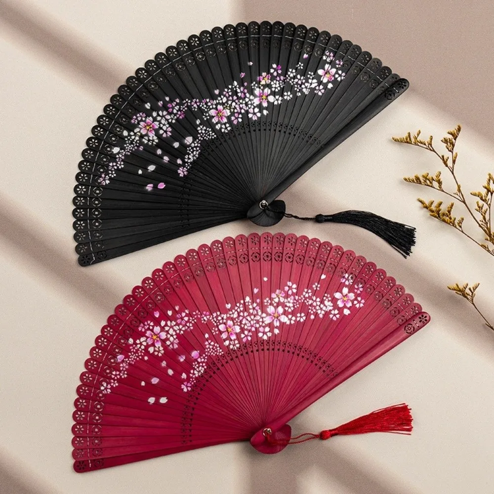 

Vintage Carved Hollowed-Out Fan with Tassel Classical Bamboo Folding Fan Natural Flower Pattern Handheld Fan Art Display