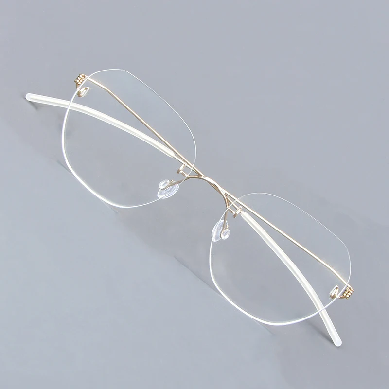 

Denmark Polygon Rimless Glasses Frame Men Women Fashion Screwless Ultralight 2460 Glasses Brand Design Customized Glasses Frames