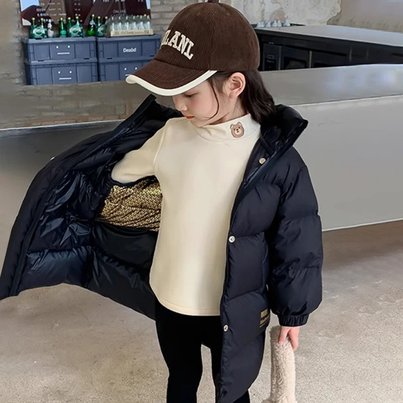 سترة شتوية عصرية جديدة لعام 2025 للفتيات بتصميم طويل سترة واقية سميكة ودافئة بقلنسوة لعمر 4-14 سنة للفتيات المراهقات والأطفال سترة سفلية