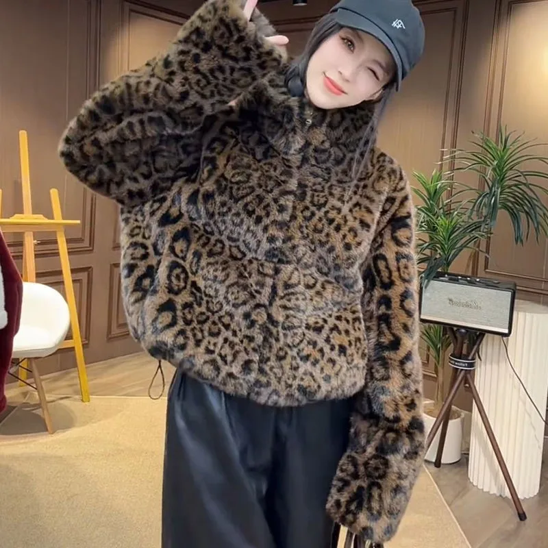The new woolen coat is loose fair and light short
