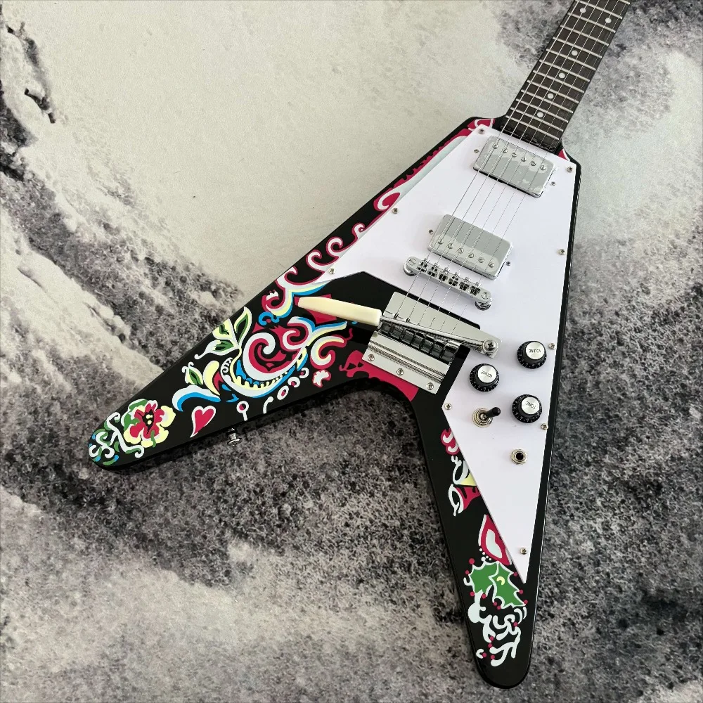 Black 6-string Mahogany Electric Guitar with A V Shaped Body Colorful Floral Motifs White Pickguard and Metal Pickups Ideal for Heavy Metal