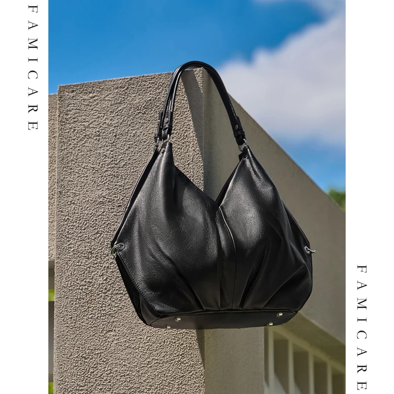 

2025 New Top Grain Leather Spacious Tote Shoulder Crossbody Bag Women Commuting Versatile Premium Unique Niche Design Handbag