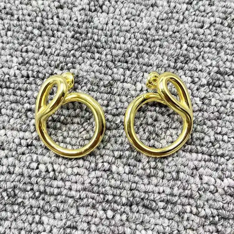 2026 Spanish punk metallic gold twisted embroidery needle shaped earrings jewelry accessories, couple gifts