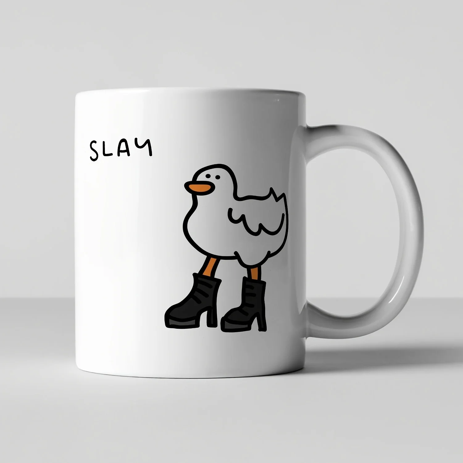 1 Fun SLAY Duck Mug - White Ceramic Coffee Mug with Black Boots and Yellow Mouth, Cute and Domineering Design, Suitable for Wome