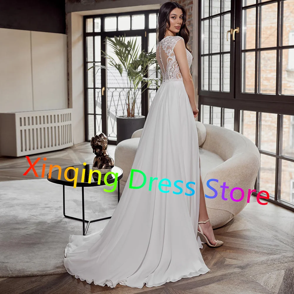 Customized Classic Chiffon Beach Wedding Dress Side Slit Cap Sleeves O-Neck Appliques Corset Sweep Train Bridal Gown Button Back