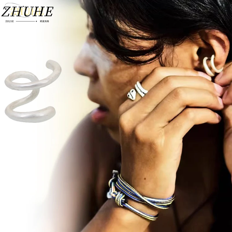 

The New Spiral Wraparound Ear Clip Without Ear Holes Features A Niche And Fashionable Design Made Of Copper, suitable For Both M