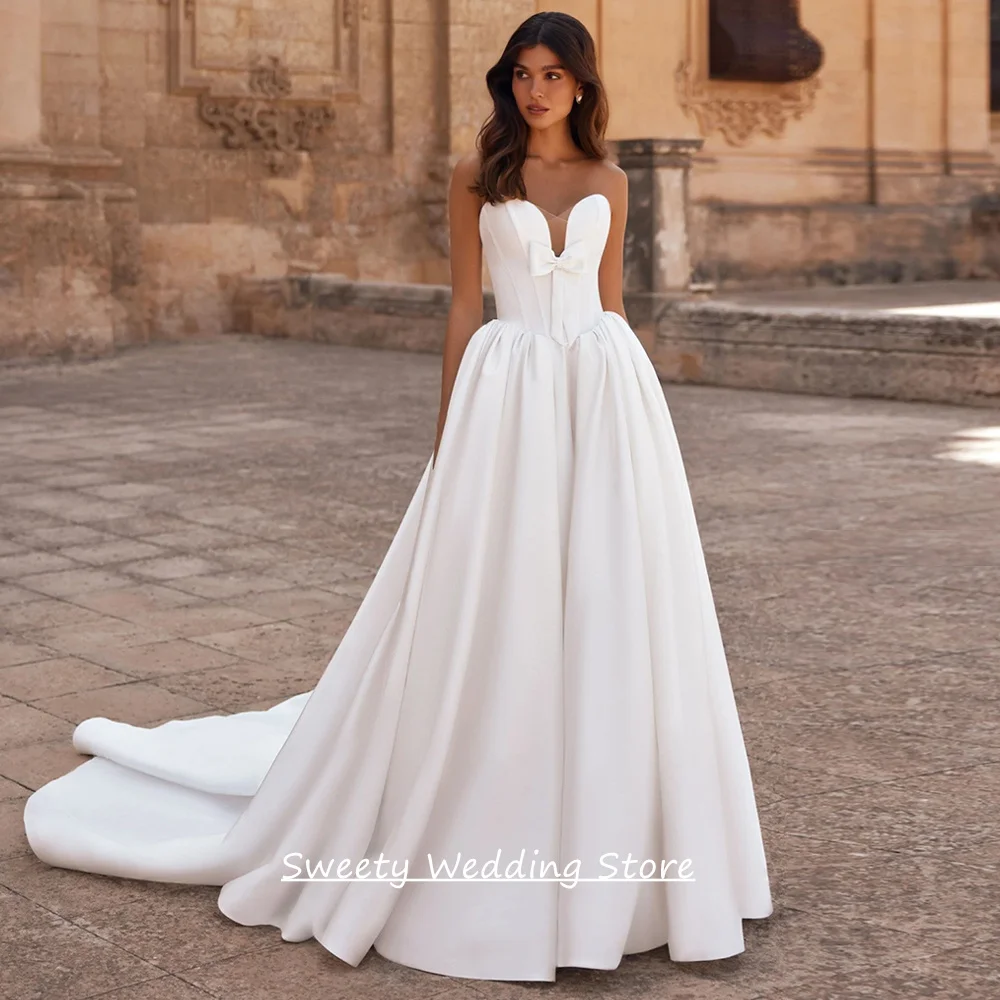 2026 Hochzeitskleid für die Braut, maßgeschneidert, ärmellos, mit Herzausschnitt, Schleife, Hofschleppe, A-Linie, Satin, Korsett, Brautkleid