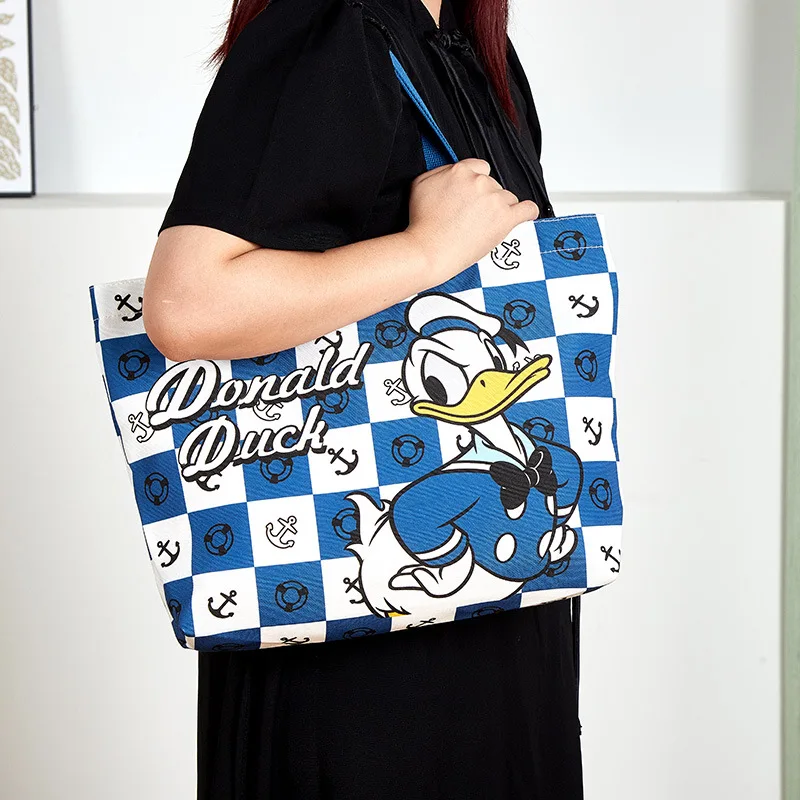 Disney-Sac à provisions étanche Stitch pour femme, sac à main portable, carillon, dessin animé, Kawaii, Lotso, mignon