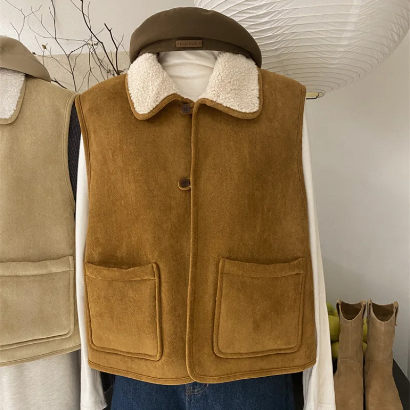 

Korean doll collar fur integrated vest women's winter new product looks slim and warm, wearing a short velvet jacket