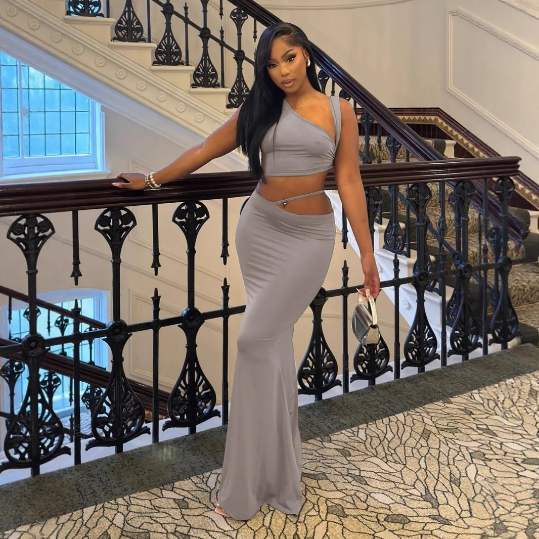 

Europe and the United States in the summer new solid color va va voom one-shoulder diagonal collar blouse navel skirt suit