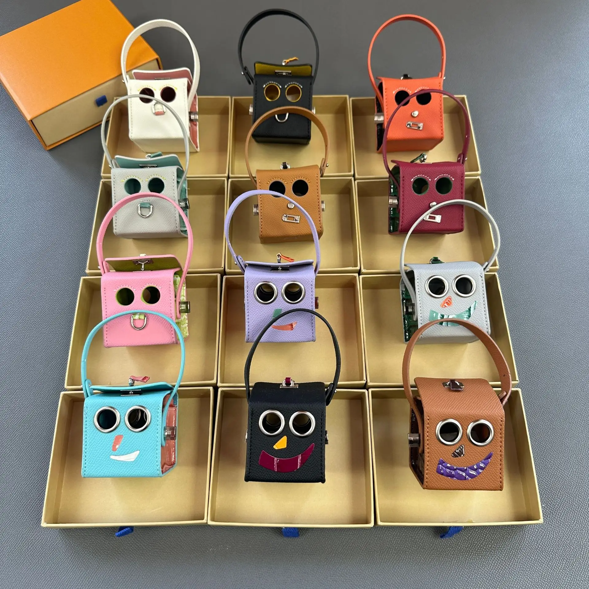 

New Leather Earphone Bag Charm Neat And Orderly Storage Cute Funny Keychain Pendant Robot Creative Design Mini Bag Accessories