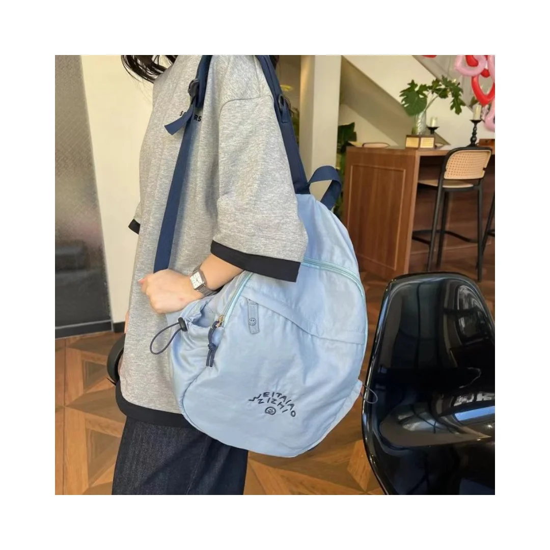 Embroidery smiling face haze blue backpack Korean female large capacity student bag outdoor travel light hiking backpack