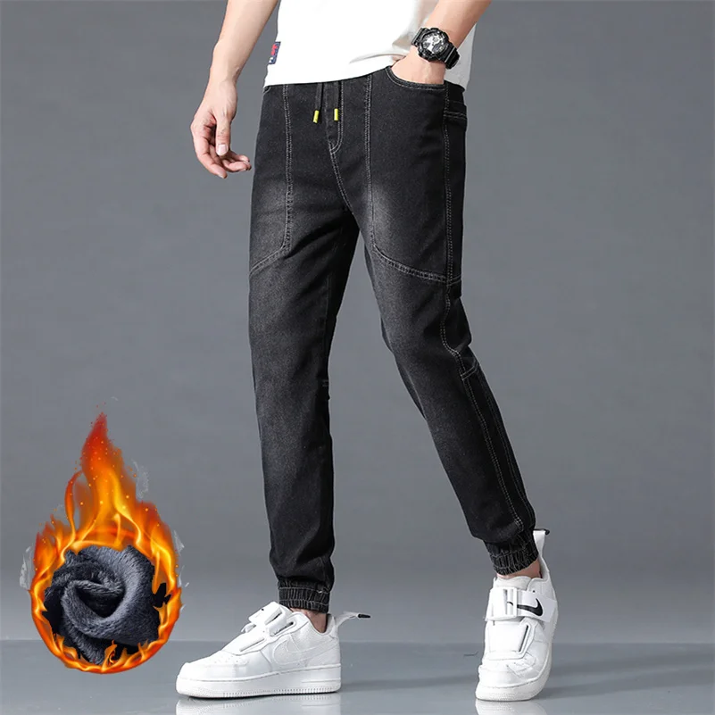 New Winter Men Warm Thermal Black Blue Cargo Jeans Fleece Streetwear Denim Jogger Pants pantaloni larghi Harem in pelliccia spessa Plus Size