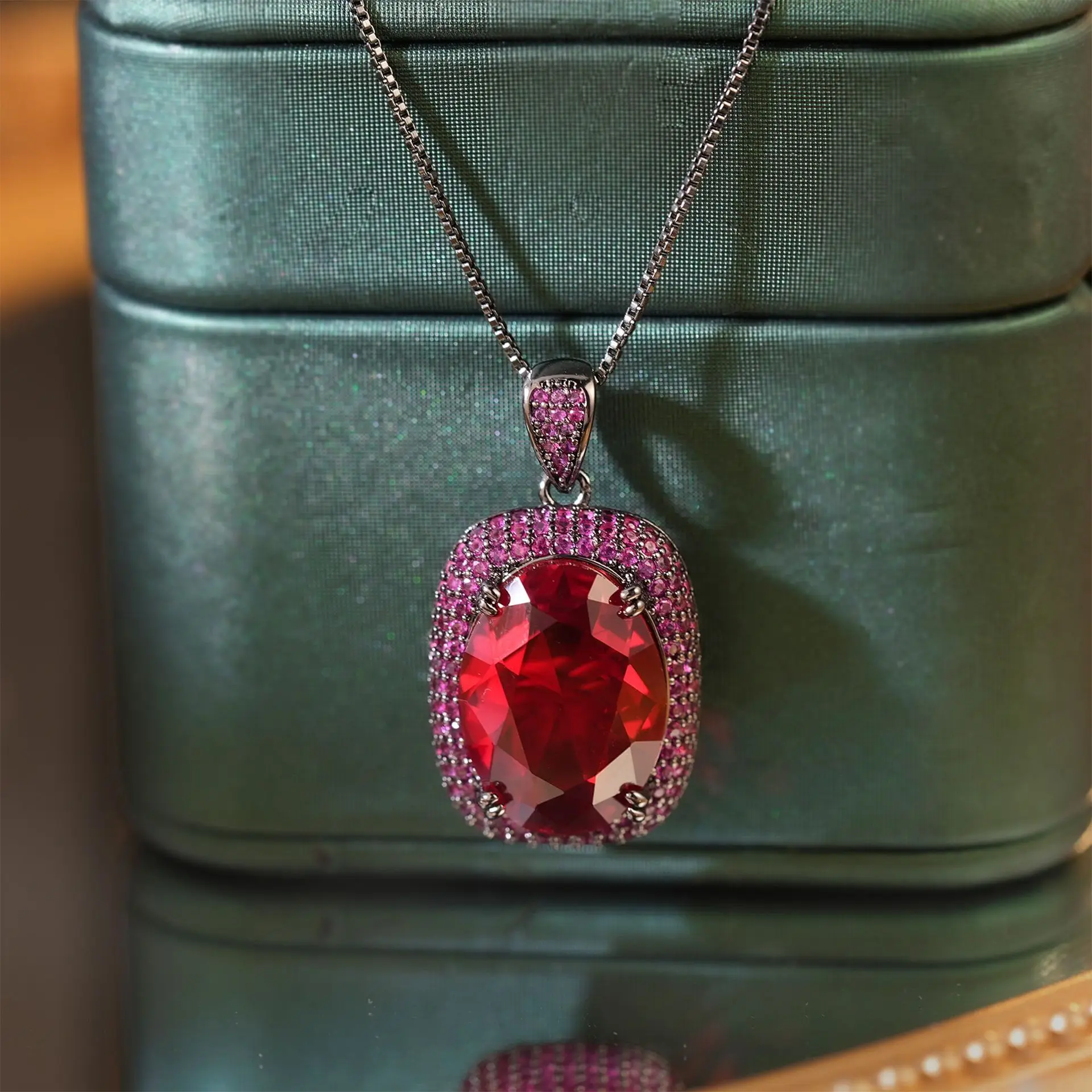 2026 New Vintage Black Gold Plated Oval Cut 13x18mm Red Gem Pendant Necklace For Women With Halo Pink Cz Accents Polished Finish