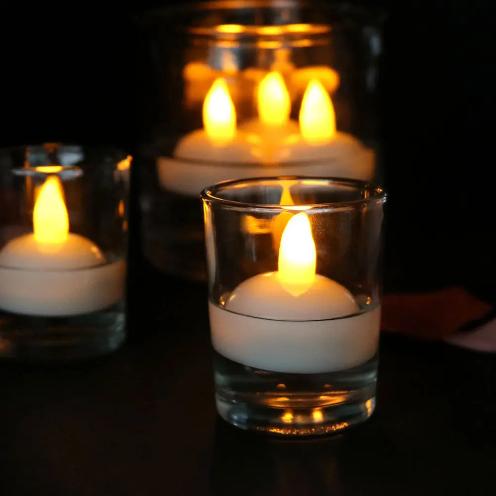 Waterproof Floating LED Tealight Candles 24 Pack Warm Yellow Electronic Lights for Pool Wedding Party Decor