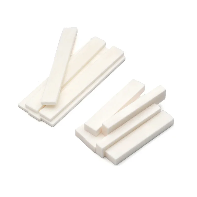 100 قطعة عالية الجودة لتقوم بها بنفسك فارغة الجاموس العظام الغيتار الجوز السرج للكهرباء باس الصوتية الكلاسيكية الغيتار مندولين البانجو القيثارة