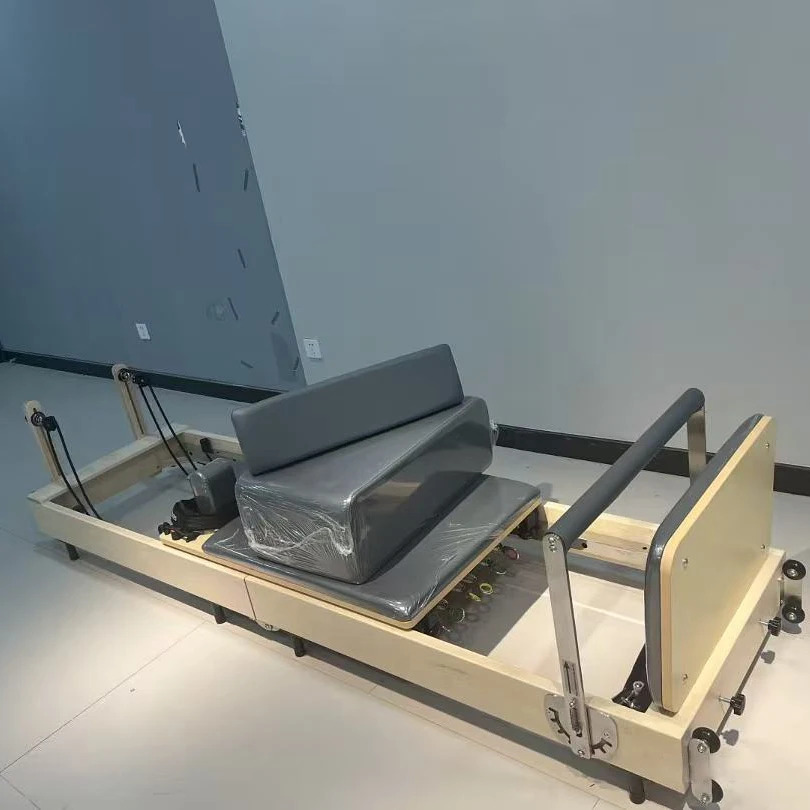 Ce Certified Fully Customizable Reformers High End Gym Fitness Best Classical Wood Foldable Pilates Reformer for Studio Orders