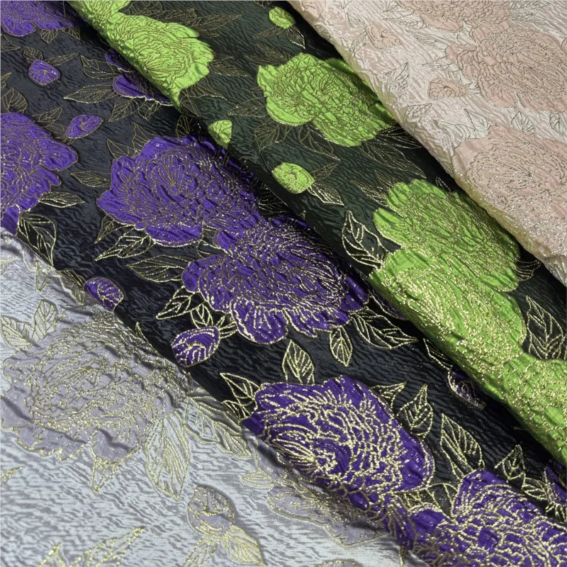 

Gold-embossed jacquard dress fabric thin and light luxury wedding embossed fashion designer
