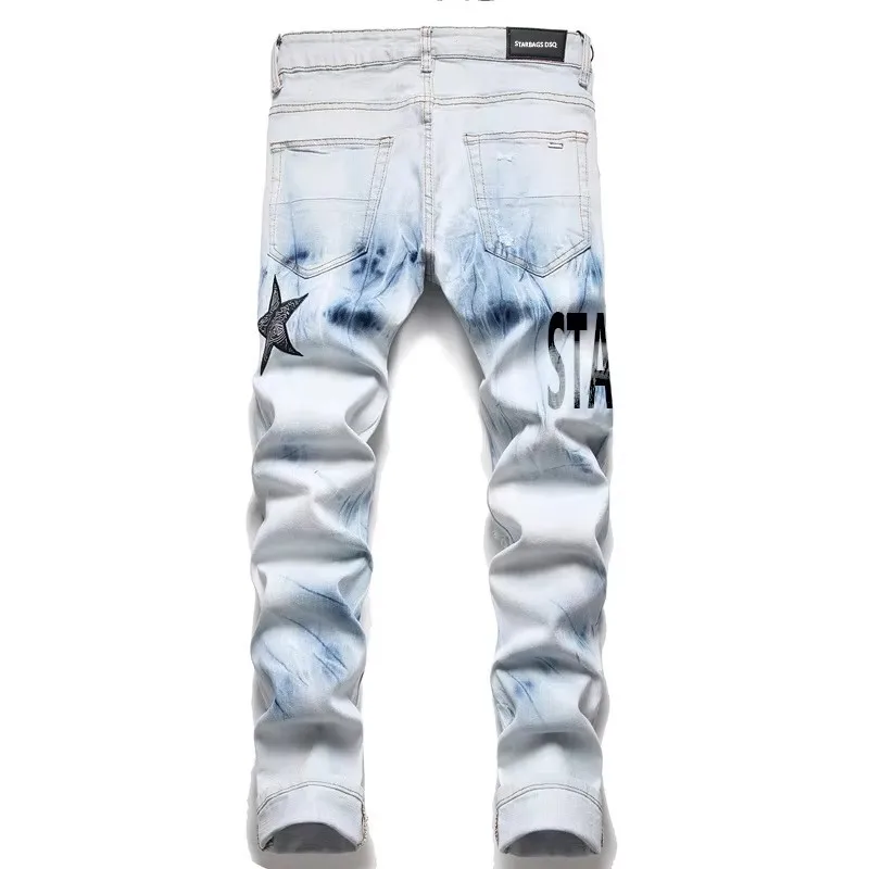 جينز رجالي بتصميم إيطالي Ami3091 بنطال جينز ممزق ومطرز على شكل نجمة خماسية مرن ونحيف للقدم سراويل رجالية مناسبة تمامًا