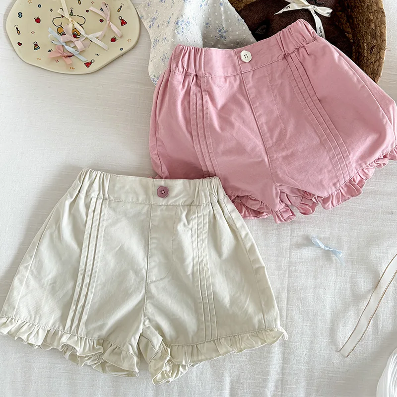 2025 New Children's Baby Korean Version Versatile Casual Lace and Black Fungus Edge Clean Color Shorts Girls' Summer Shorts