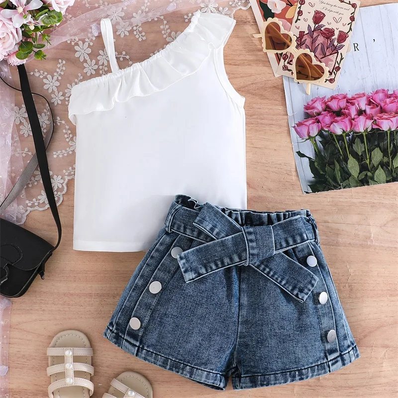 สาวดอกไม้พิมพ์ Ruffle เสื้อแขนกุดและกางเกงขาสั้นชุดฤดูร้อนชุดเด็กวัยหัดเดินเสื้อผ้าเด็กปิดไหล่กางเกงยีนส์กางเกงขาสั้น