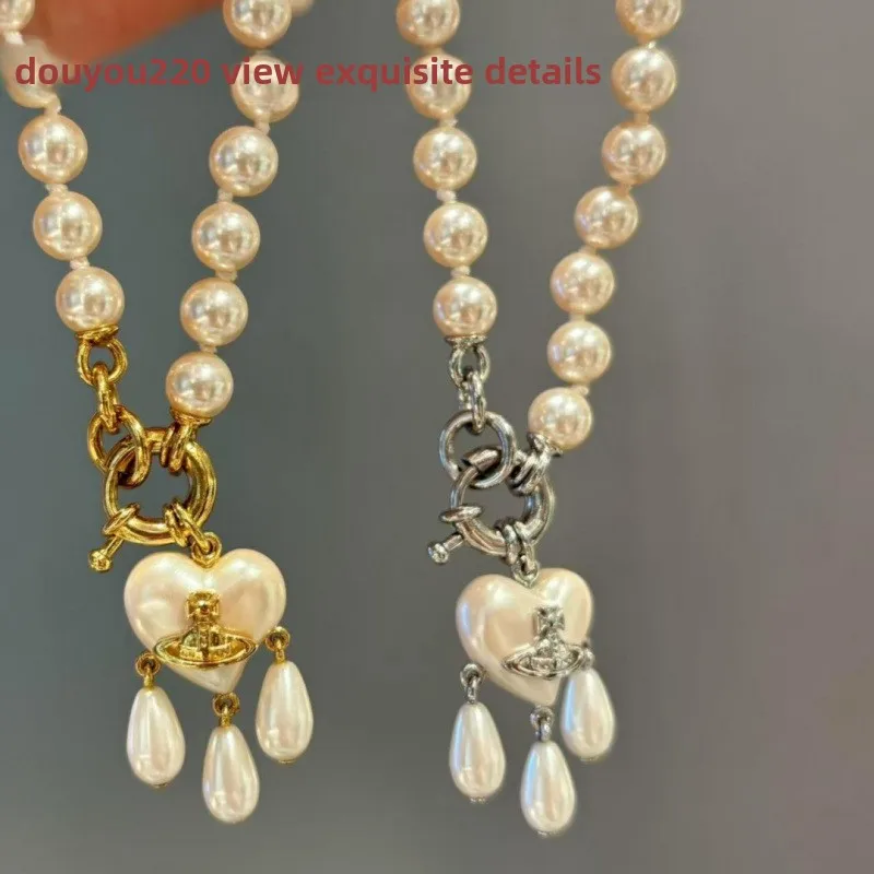 Collar de perlas en forma de corazón de lujo a la moda, elemento Saturno, pendientes colgantes con forma de estrella, gargantilla ligera para hombres y mujeres