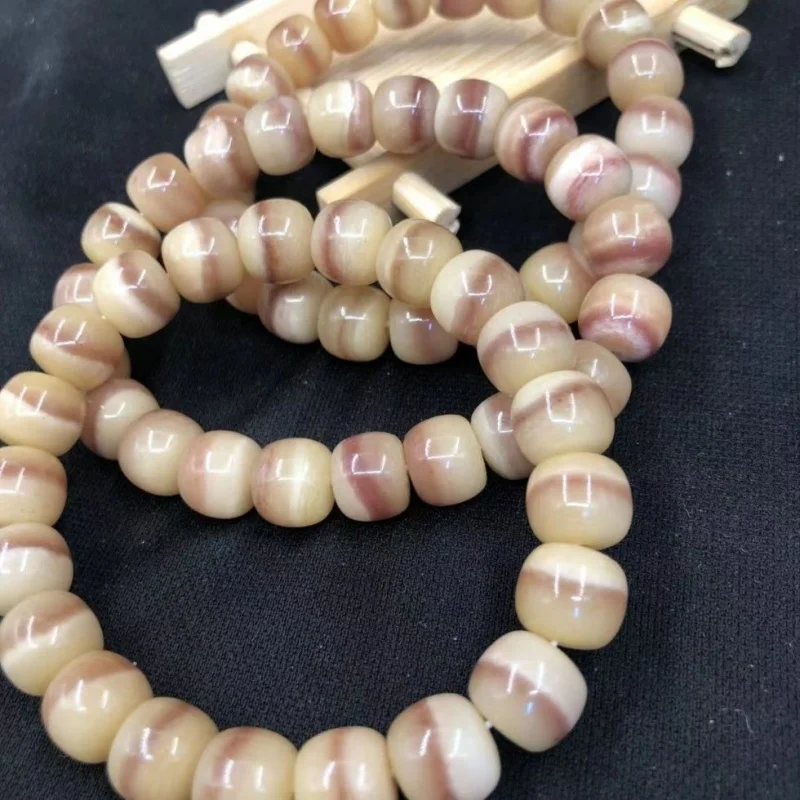 Exquisite camel bone three-flower single-thread barrel bead bracelet